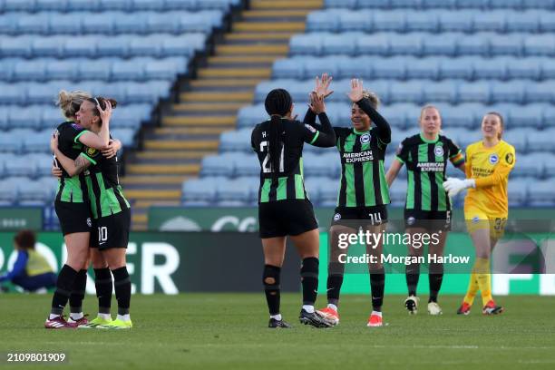 Madison Haley and Jorelyn Carabali of Brighton & Hove Albion celebrate victory in the Barclays Women's Super League match between Leicester City and...