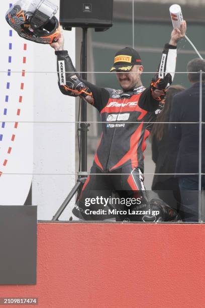 Aron Canet of Spain and Fantic Racing celebrates the victory on the podium during the Moto2 race during the MotoGP Of Portugal - Race at Autodromo do...