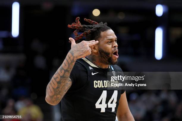 Eddie Lampkin Jr. #44 of the Colorado Buffaloes celebrates a basket against the Marquette Golden Eagles during the second half in the second round of...