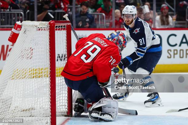 Charlie Lindgren of the Washington Capitals makes a save against Kyle Connor of the Winnipeg Jets during the first period of the game at Capital One...