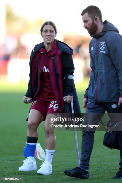 Katrina Gorry of West Ham United leaves the field at half-time on crutches during the Barclays Women's Super League match between West Ham United and...