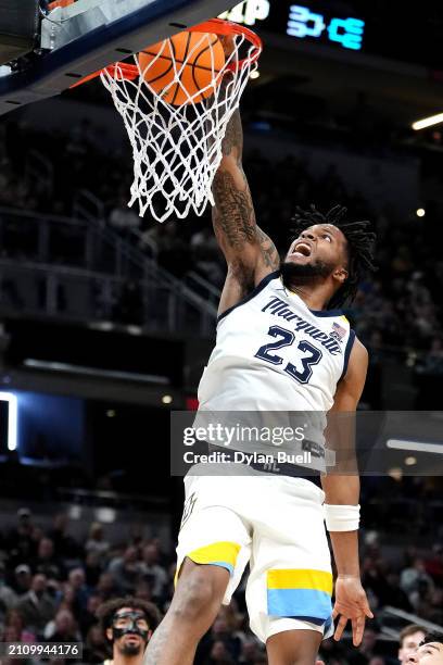 David Joplin of the Marquette Golden Eagles dunks the ball against the Colorado Buffaloes during the second half in the second round of the NCAA...