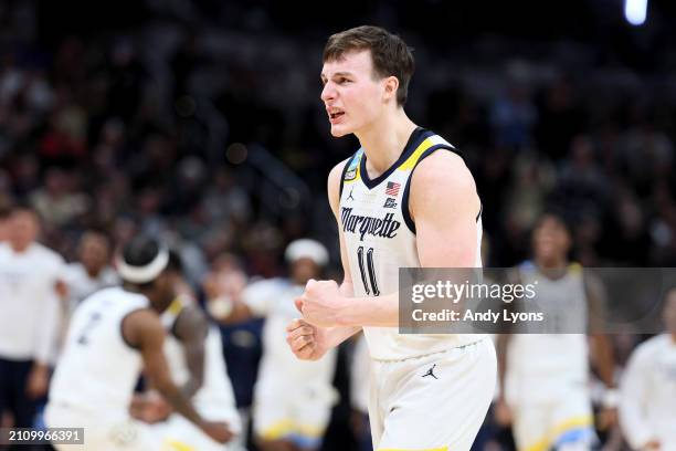 Tyler Kolek of the Marquette Golden Eagles celebrates after defeating the Colorado Buffaloes in the second round of the NCAA Men's Basketball...