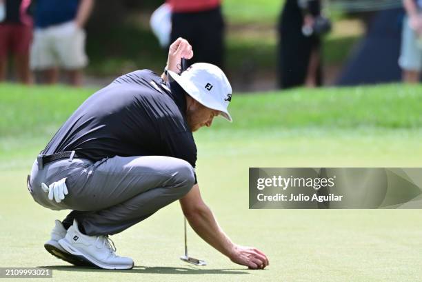 Peter Malnati of the United States putts on the second green during the final round of the Valspar Championship at Copperhead Course at Innisbrook...