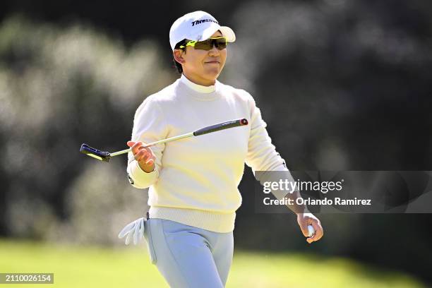 Jiyai Shin of South Korea reacts to her putt on the fifth hole during the final round of the FIR HILLS SERI PAK Championship at Palos Verdes Golf...