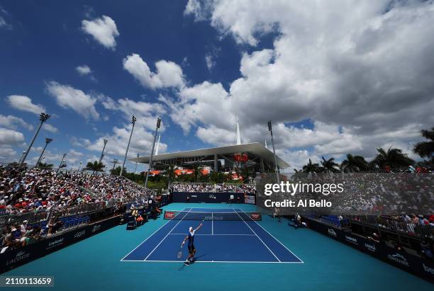 Grigor Dimitrov of Bulgaria serves against Alejandro Tabilo of Chile during their match on Day 9 of the Miami Open at Hard Rock Stadium on March 24,...