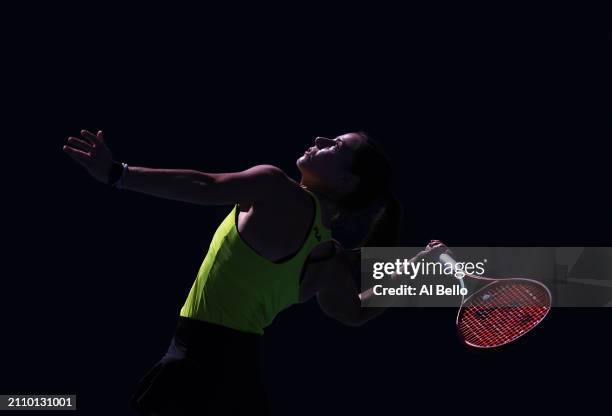 Emma Navarro serves against Jasmine Paolini of Italy during their match on Day 9 of the Miami Open at Hard Rock Stadium on March 24, 2024 in Miami...