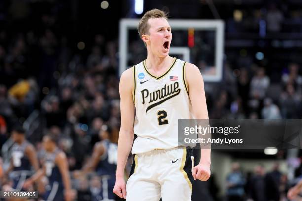 Fletcher Loyer of the Purdue Boilermakers celebrates a basket against the Utah State Aggies during the first half in the second round of the NCAA...