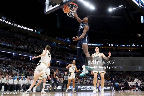 Great Osobor of the Utah State Aggies dunks the ball against the Purdue Boilermakers during the first half in the second round of the NCAA Men's...