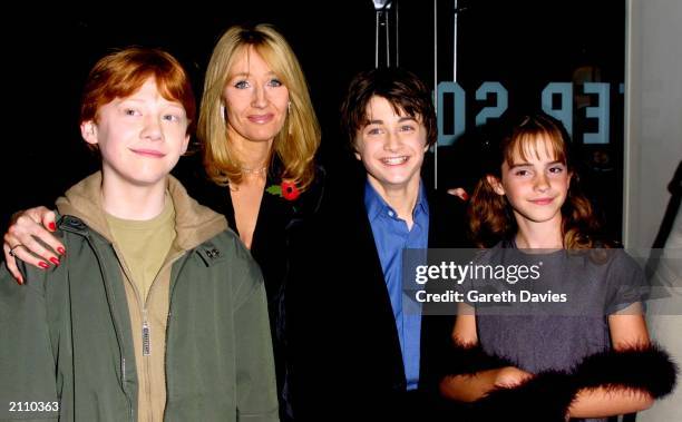 Actors Rupert Grint, Author JK Rowling, Daniel Radcliffe and Emma Watson attend the world premiere of the first Harry Potter film, 'Harry Potter and...