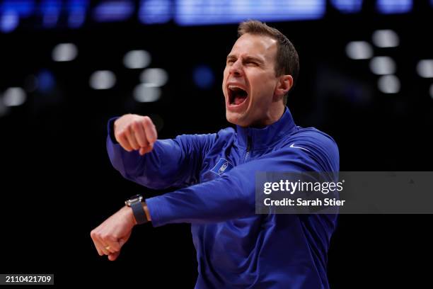 Head coach Jon Scheyer of the Duke Blue Devils reacts during the first half against the James Madison Dukes in the second round of the NCAA Men's...