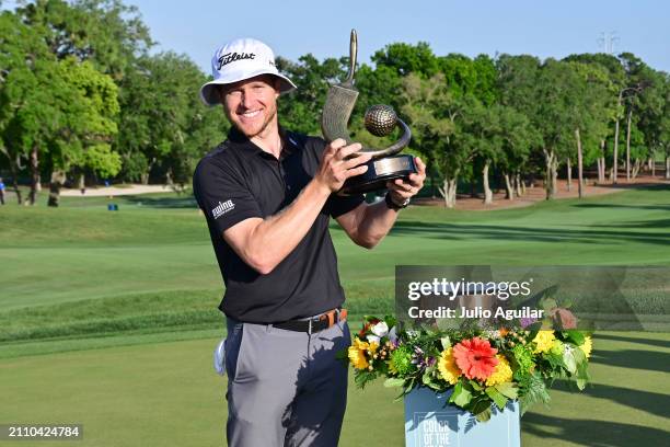 Peter Malnati of the United States poses with the Valspar Championship Trophy after the final round of the Valspar Championship at Copperhead Course...