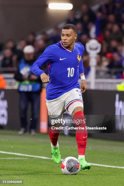 Kylian Mbappe of France controls the ball during the international friendly match between France and Germany at Groupama Stadium on March 23, 2024 in...