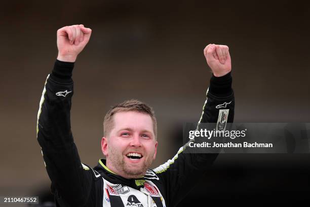 William Byron, driver of the RaptorTough.com Chevrolet, celebrates after winning the NASCAR Cup Series EchoPark Automotive Grand Prix at Circuit of...