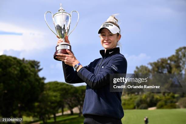 Nelly Korda of the United States celebrates with the trophy after winning the FIR HILLS SERI PAK Championship at Palos Verdes Golf Club on March 24,...