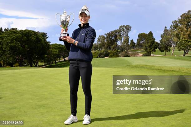 Nelly Korda of the United States celebrates with the trophy after winning the FIR HILLS SERI PAK Championship at Palos Verdes Golf Club on March 24,...