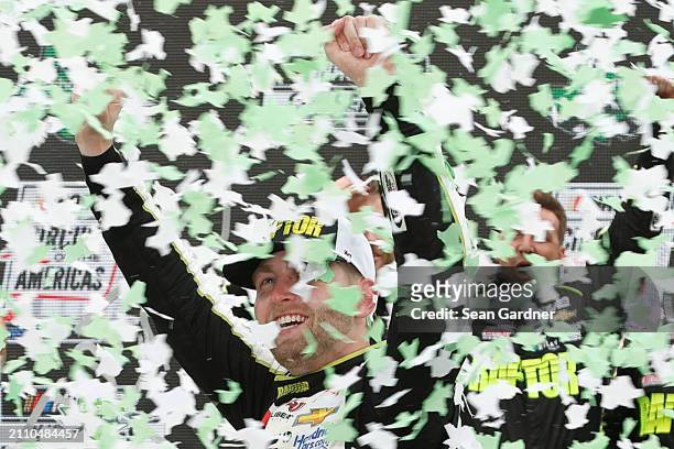 William Byron, driver of the RaptorTough.com Chevrolet, celebrates in victory lane after winning the NASCAR Cup Series EchoPark Automotive Grand Prix...
