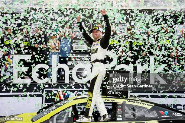 William Byron, driver of the RaptorTough.com Chevrolet, celebrates in victory lane after winning the NASCAR Cup Series EchoPark Automotive Grand Prix...