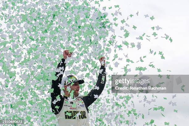 William Byron, driver of the RaptorTough.com Chevrolet, celebrates in victory lane after winning the NASCAR Cup Series EchoPark Automotive Grand Prix...