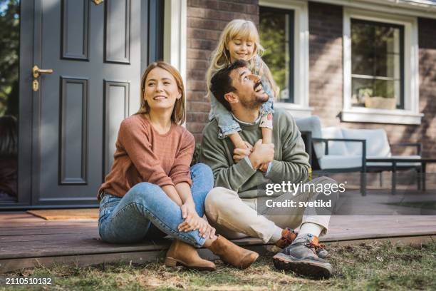 young family enjoying in sunny day - in front of stock pictures, royalty-free photos & images