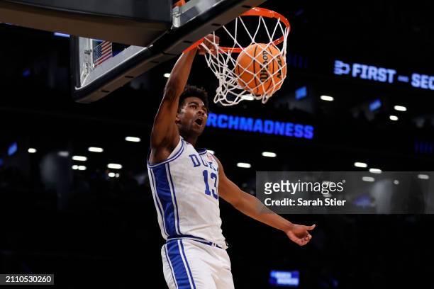 Sean Stewart of the Duke Blue Devils dunks the ball during the second half against the James Madison Dukes in the second round of the NCAA Men's...