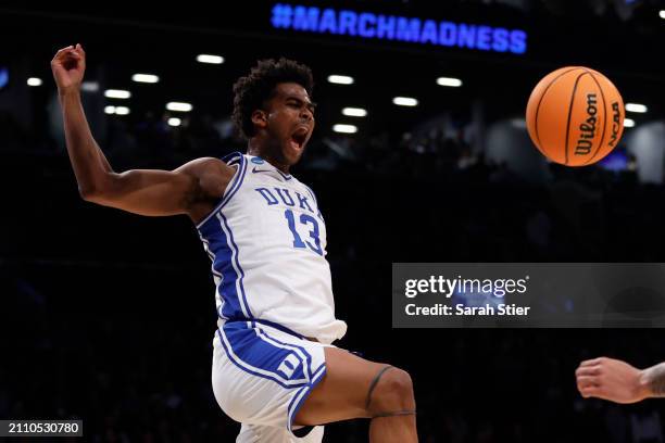Sean Stewart of the Duke Blue Devils reacts after a dunk during the second half against the James Madison Dukes in the second round of the NCAA Men's...