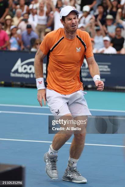 Andy Murray of Great Britain screams in pain after hurting his left ankle during his match against Tomas Machac of the Czech Republic on Day 9 of the...