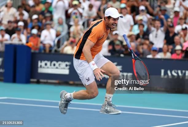 Andy Murray of Great Britain screams in pain after hurting his left ankle during his match against Tomas Machac of the Czech Republic on Day 9 of the...