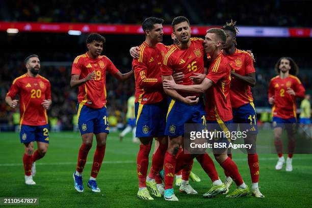 Rodri of Spain celebrates after scoring the team's first goal with Lamine Yamal of Spain, Alvaro Morata of Spain, Dani Olmo of Spain and Nico...