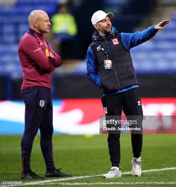 Lee Carsley, Head Coach of England, speaks to Dan Huet, Head Coach of Luxembourg, prior to the UEFA U21 Euro 2025 Qualifier between England and...