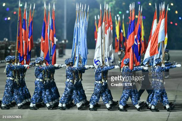 Myanmar junta military soldiers parade during a ceremony to mark the country's Armed Forces Day in Naypyidaw on March 27, 2024. Myanmar's junta chief...