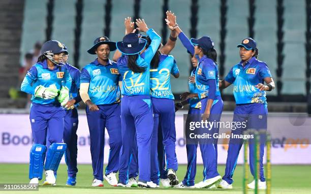 Inoshi Fernando of Sri Lanka celebrates the dismissal of Tazmin Brits of South Africa with her teammates during the 1st Women's T20I match between...