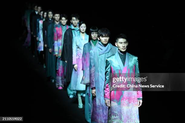 Models walk the runway at the BOTAO collection show by designer Bo Yulong and Cong Xiaochuan on day two of China Fashion Week A/W 2024 at Beijing...