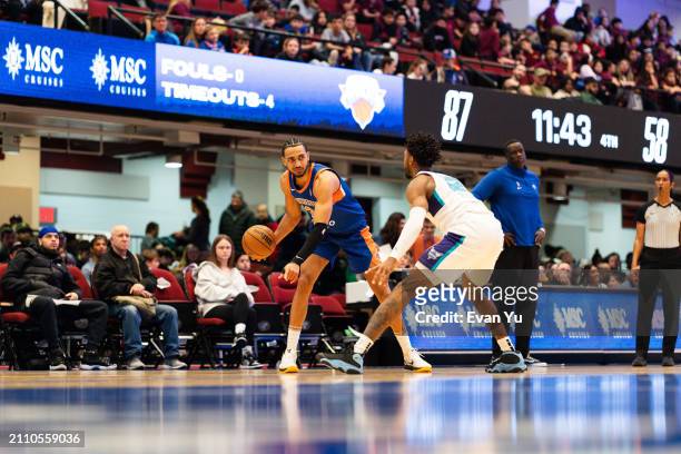 Jacob Toppin of the Westchester Knicks handles the ball against the Greensboro Swarm on March 27, 2024 at the Westchester County Center in White...