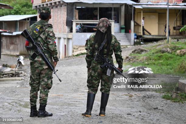 Members of the Carlos Patino front of the dissident FARC guerrilla patrol in Micay Canyon, a mountainous area and EMC stronghold in Cauca Department,...