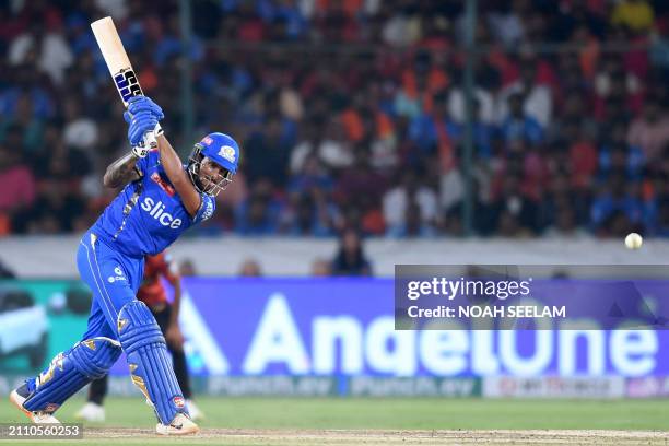 Mumbai Indians' Tilak Varma plays a shot during the Indian Premier League Twenty20 cricket match between Sunrisers Hyderabad and Mumbai Indians at...