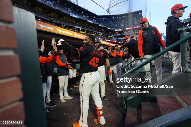 Pablo Sandoval acknowledges his teammates in the dugout at Oracle Park on March 26, 2024 in San Francisco, California.