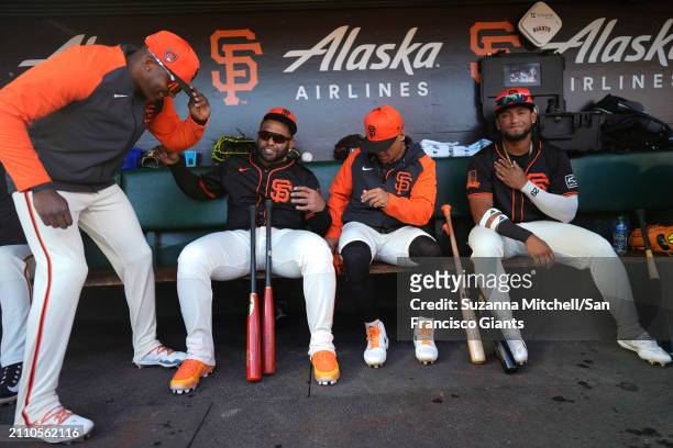 Marco Luciano , Pablo Sandoval , Ismael Munguia and Luis Matos of the San Francisco Giants prepare for the Giants game at Oracle Park on March 26,...