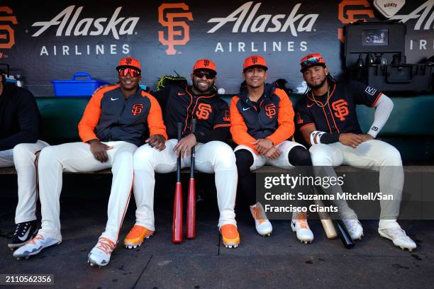 Marco Luciano , Pablo Sandoval , Ismael Munguia and Luis Matos of the San Francisco Giants prepare for the Giants game at Oracle Park on March 26,...