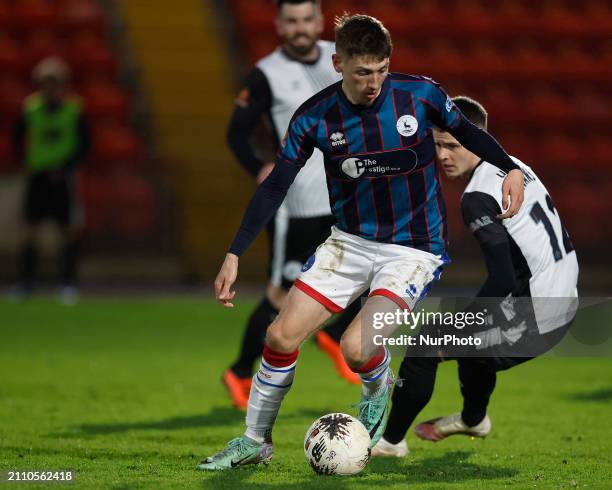 Joe Grey of Hartlepool United is battling with Kieron Evans of Gateshead during the Vanarama National League match between Gateshead and Hartlepool...