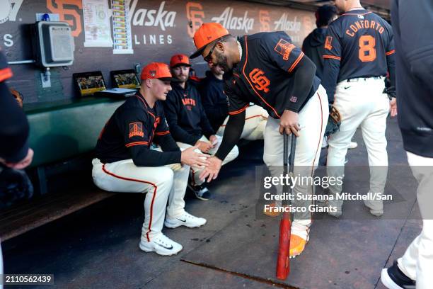 Matt Chapman and Pablo Sandoval of the San Francisco Giants prepares for the Giants game at Oracle Park on March 26, 2024 in San Francisco,...