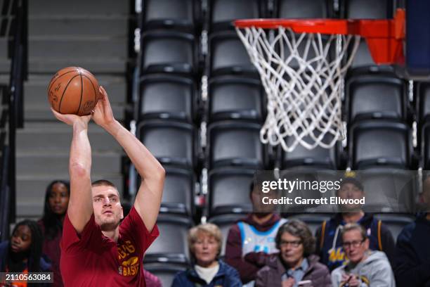 Nikola Jokic of the Denver Nuggets warms up before the game against the Memphis Grizzlies on March 25, 2024 at the Ball Arena in Denver, Colorado....
