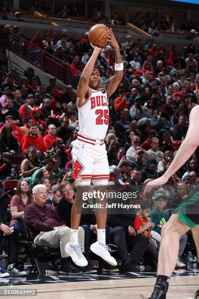 Dalen Terry of the Chicago Bulls shoots a three point basket during the game against the Boston Celtics on March 23, 2024 at United Center in...