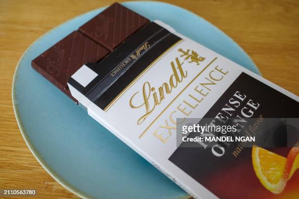 Photo illustration shows a bar of chocolate in Washington, DC, on March 27, 2024. Cocoa briefly topped $10,000 per tonne in New York on Tuesday -- a...