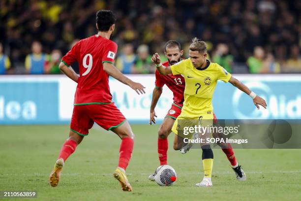 Omer Al Malki , Abdul Aziz Al Shamousi of Oman and Faisal Halim of Malaysia in action during the 2026 World Cup/2027 Asian Cup Qualifiers Group D...