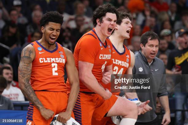 Dillon Hunter, Ian Schieffelin, and PJ Hall of the Clemson Tigers react from the bench during the second half against the Baylor Bears in the second...
