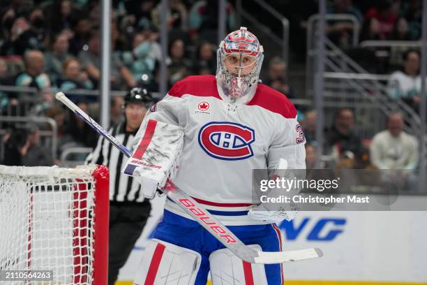 Cayden Primeau of the Montreal Canadiens looks on during the first period of a game against the Seattle Kraken at Climate Pledge Arena on March 24,...