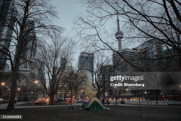 The unhoused find shelter in makeshift tent encampments at Clarence Square park in Toronto, Ontario, Canada, on Wednesday, Feb. 21, 2024. Toronto is...