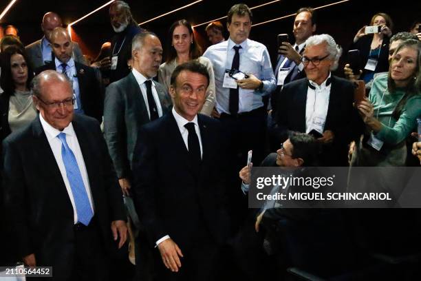 France's President Emmanuel Macron and Brazil's Vice President Geraldo Alckmin arrive at the France-Brazil Economic Forum at the Federation of...