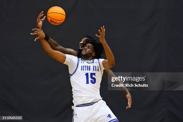 Jaden Bediako of the Seton Hall Pirates battles Kalib Boone of the UNLV Runnin' Rebels for a rebound during the first half of an NIT quarterfinal...